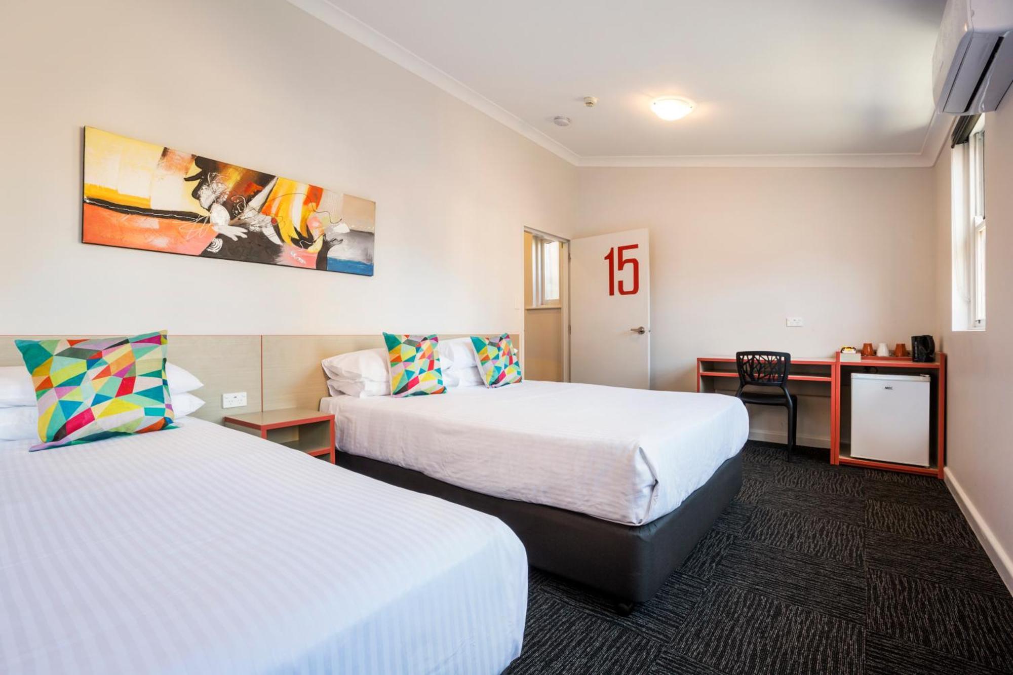 Economy Twin Queen Shared Facilities