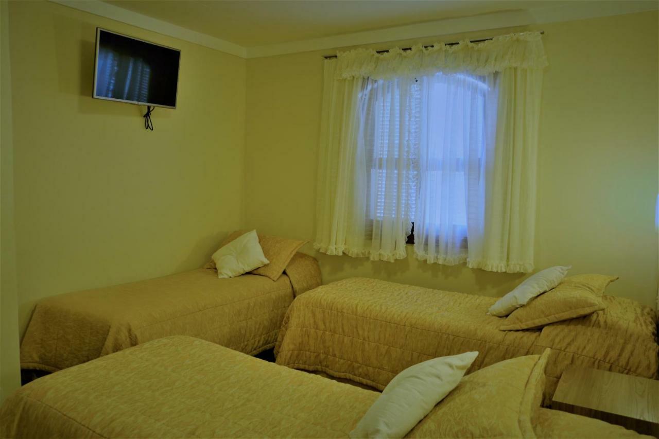 Quarto Quádruplo com Varanda