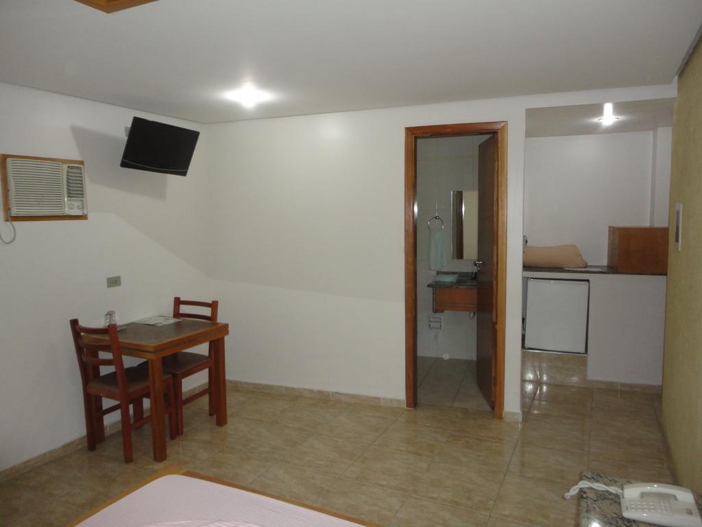Quarto Duplo com Cama de Casal e Ar-condicionado