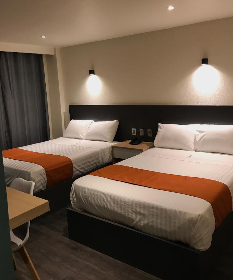 Habitación Cuádruple Deluxe