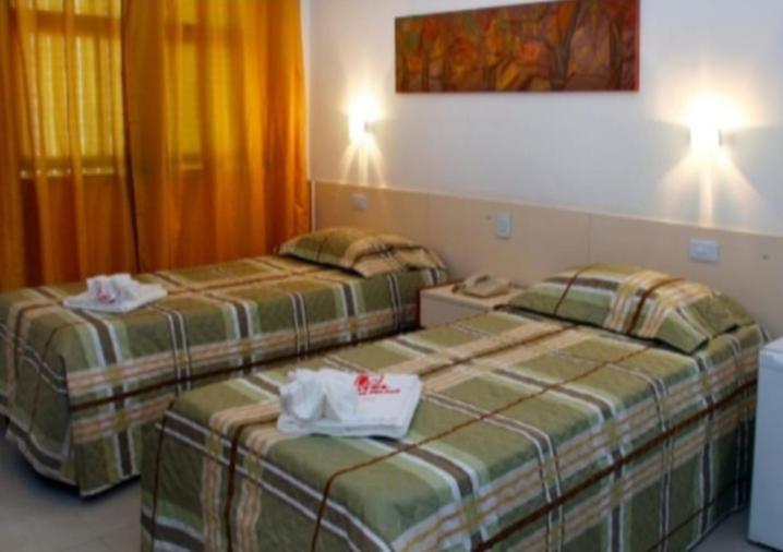 Quarto com 2 camas de solteiro com Ar Condicionado