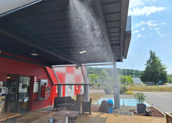 ENZO HOTELS GREEN proximité ZENITH D' AUVERGNE Ex F1 FORMULE 1 CLERMONT FERRAND ISSOIRE COUDES