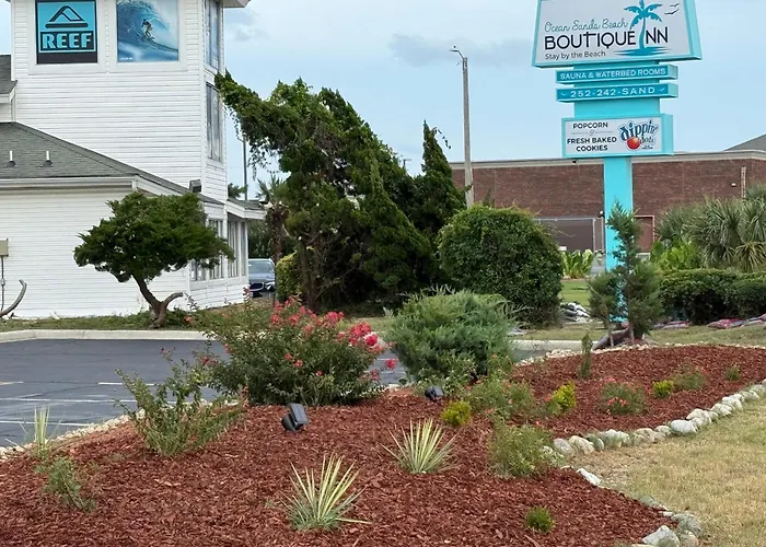 New 2026-Ocean Sands Beach Boutique Inn-Sauna And Salt-Mineral Pool -Free Beach Bikes And Famous Beach- Fresh Baked Cookies And Popcorn - Bathrobes And Sunscreen In All Rooms-Ultra Sparkling-Free Laundry- 4 Grand Black Beds-Call Now & Save-1-252-Aha-