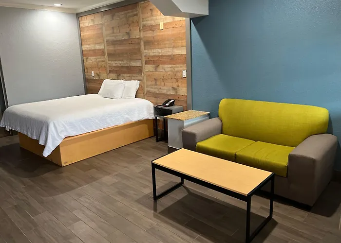 Symphony Inn & Suites