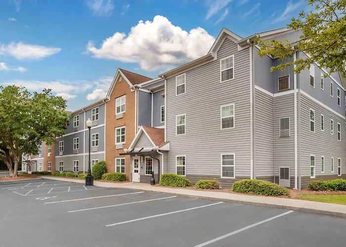 Alluxsuites At 1876, An Ascend Collection Hotel